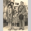 Kanekazu Okada and his family wearing leis (ddr-njpa-4-1975)