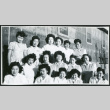 Photograph of the hospital staff aides in front of the Manzanar hospital (ddr-csujad-47-194)