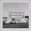 Yoshiko, William, Susan and Leslie Shiomi standing by sign for Tillamook Cheese Factory (ddr-densho-522-556)