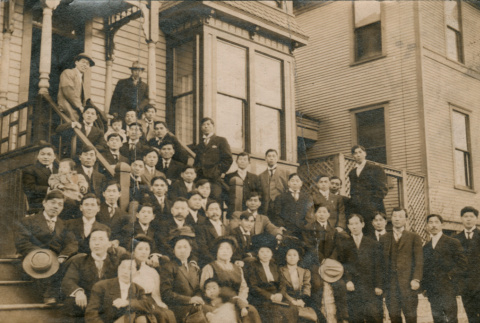 Large group photo on house stoop (ddr-densho-348-86)