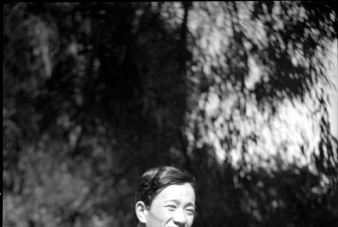 Man sitting on lawn (ddr-densho-426-2183)