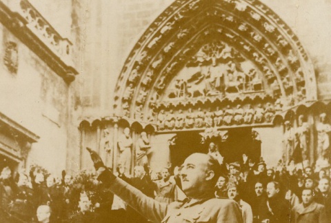 Francisco Franco saluting in front of a church (ddr-njpa-1-350)
