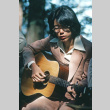 Mike Okagaki playing guitar at the Endo-Furumura wedding (ddr-densho-336-1165)
