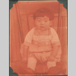 Child sitting on chair (ddr-densho-316-376)