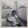 Susan Shiomi in stroller (ddr-densho-522-146)