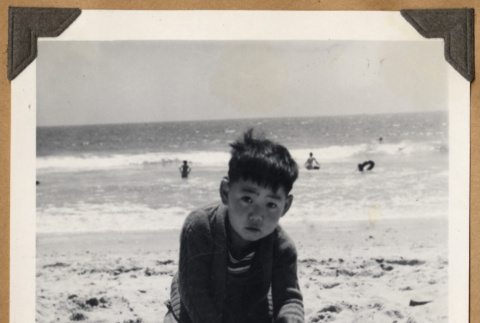 Boy at the beach (ddr-densho-542-91)