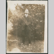 Man standing in garden (ddr-densho-483-515)