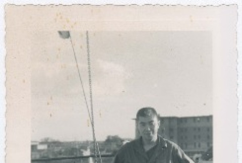 (Photograph) - Image of man standing on deck of ship (PDF) (ddr-densho-332-29-mezzanine-f956725cff)