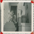 Family on front steps (ddr-densho-321-1095)