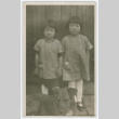 Postcard photograph of two girls with dog (ddr-densho-383-444)