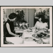 Two women and child at table (ddr-densho-293-140)
