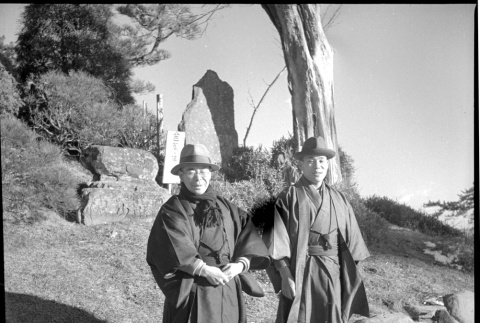 Two men standing on hillside (ddr-densho-426-269)