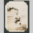Man crouching (ddr-densho-545-33)