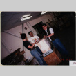 Three men in warehouse (ddr-densho-426-1353)