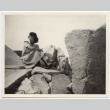 Girl posing on rock (ddr-hmwf-1-13)