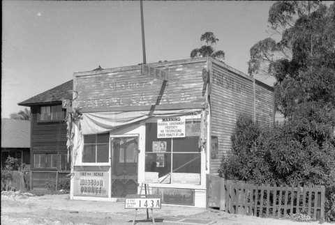 Storefront labeled East San Pedro Tract 143A (ddr-csujad-43-49)