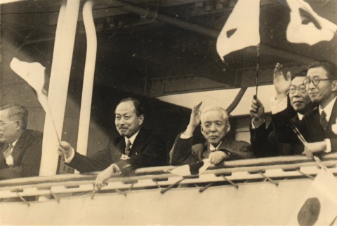 Men waving Japanese flags (ddr-njpa-4-2828)