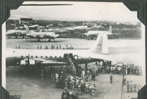 Crowd outside airplane (ddr-ajah-2-712)