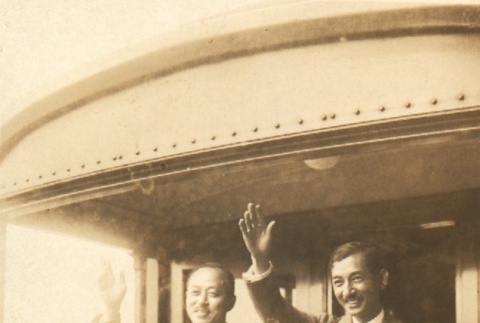 Hiroshi Saito and a man waving (ddr-njpa-4-2511)