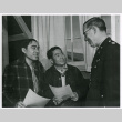 Two young Nisei men signing enlistment papers (ddr-densho-122-756)
