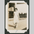 woman leaning against a pole (ddr-densho-378-600)