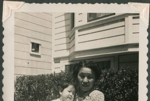 A woman and baby outside (ddr-densho-321-1013)