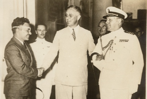 Wiley Post shaking hands with Franklin D. Roosevelt (ddr-njpa-1-1319)