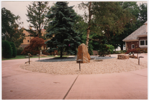 Rock landscaping in driveway (ddr-densho-377-1868)