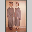 Couple in graduation robes (ddr-densho-523-390)
