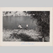 View of river with four people in shallows (ddr-densho-464-51)