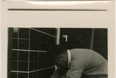 Man working on tile (ddr-densho-426-1402)