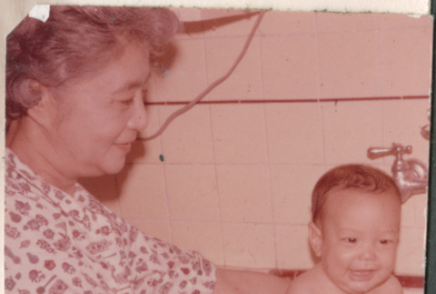 Baby having a bath (ddr-densho-523-401)