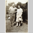 Smiling couple in yard (ddr-densho-1007-594)