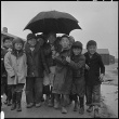 Japanese American children in the rain (ddr-densho-37-628)