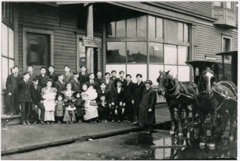A group in front of the Eagle Laundry (ddr-densho-353-93)
