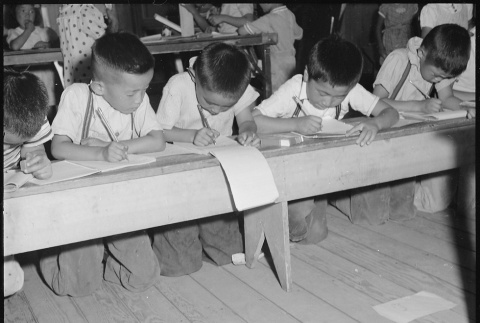 Japanese Americans studying in classroom (ddr-densho-151-367)