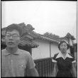 Man and woman outside building (ddr-densho-426-2478)