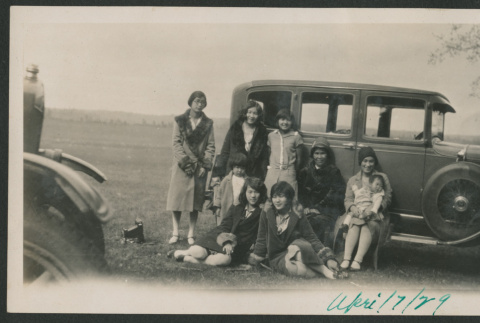 family photo next to a car (ddr-densho-378-576)