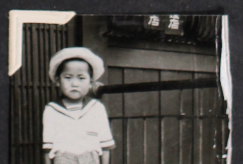 Boy in sailor suit with hat (ddr-densho-468-477)