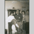 4 people standing, Agnes Sakura sitting (ddr-densho-523-447)