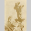 Mustapha Kemal (Pasha) Ataturk looking through binoculars (ddr-njpa-1-1305)