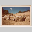 Rock waterfall and pond under construction (ddr-densho-377-2194)