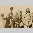 Victor Fleming, Sojin Kamiyama, Douglas Fairbanks, and Sessue Hayakawa waving on the deck of a ship (ddr-njpa-1-391)