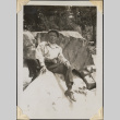 Man sitting on boulders (ddr-densho-466-877)