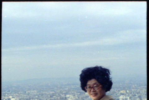 Martha (Nozawa) Tsuchida on deck of Eiffel Tower (ddr-densho-426-720)