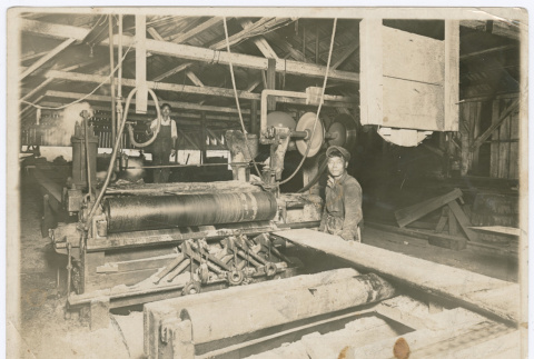 Two men working in sawmill (ddr-densho-383-377)
