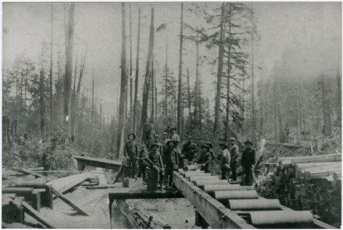 Workers at a log conveyor (ddr-densho-353-47)