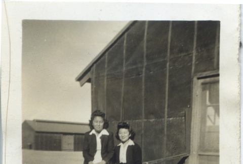 Two women outside barracks (ddr-manz-6-113)