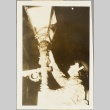 An air raid warden changing a street lamp (ddr-njpa-13-229)