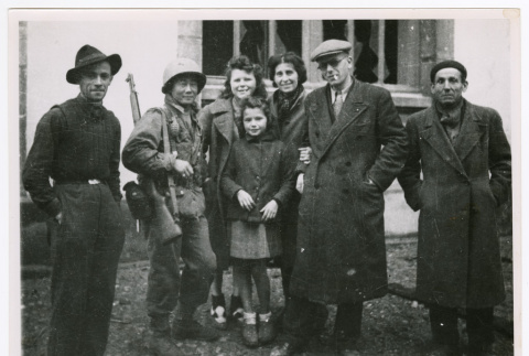 Soldier with civilians in Bruyeres (ddr-densho-1007-39)